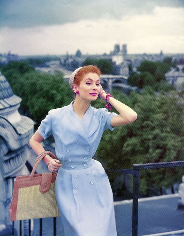 #7 Suzy Parker in dress by Jean Patou on the roof of the Louvre Museum, Elle, July 1954
