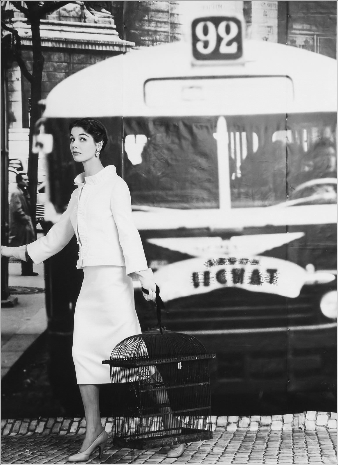 #47 Enid Boulting in suit by Givenchy, 1955