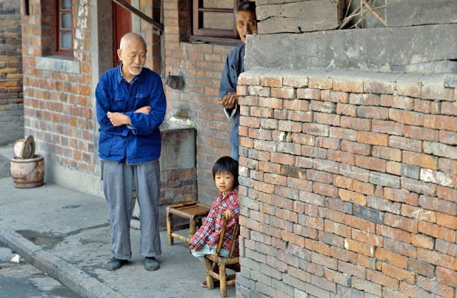 #25 Jiangsu. Chinese family operating a small freight barge on the Emperors Channel, Wuxi