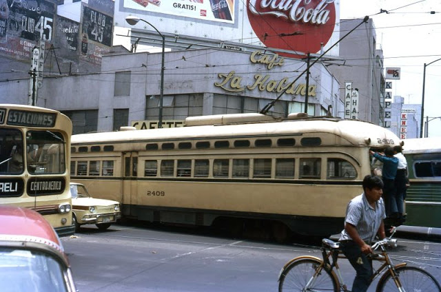 #26 Mexico City. PCC No. 2409 with youths riding on bumper near the Railway Station