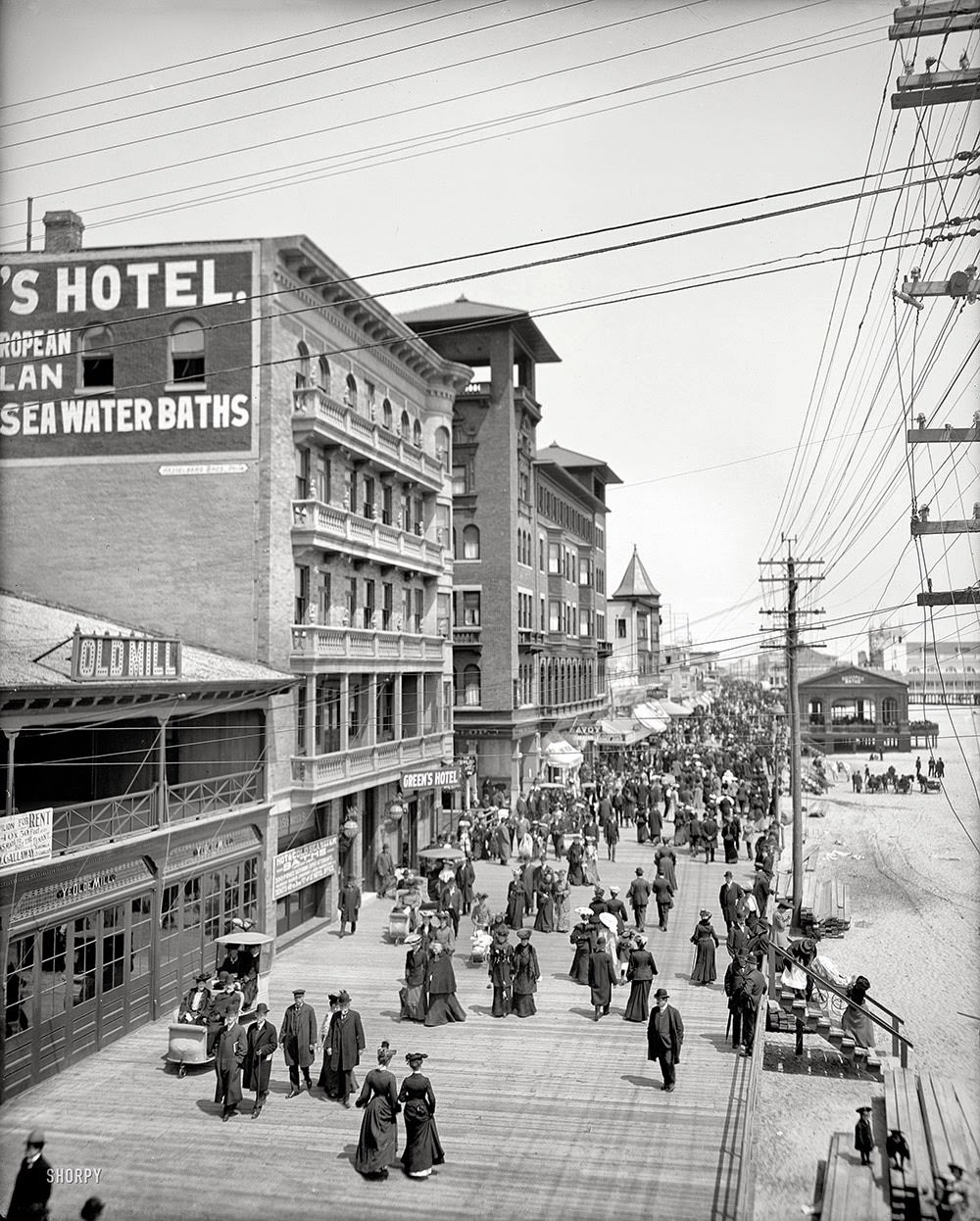 #20 Circa 1905. Boardwalk, Atlantic City. Strollers on parade, at least one beach baby, and a number of ponies.