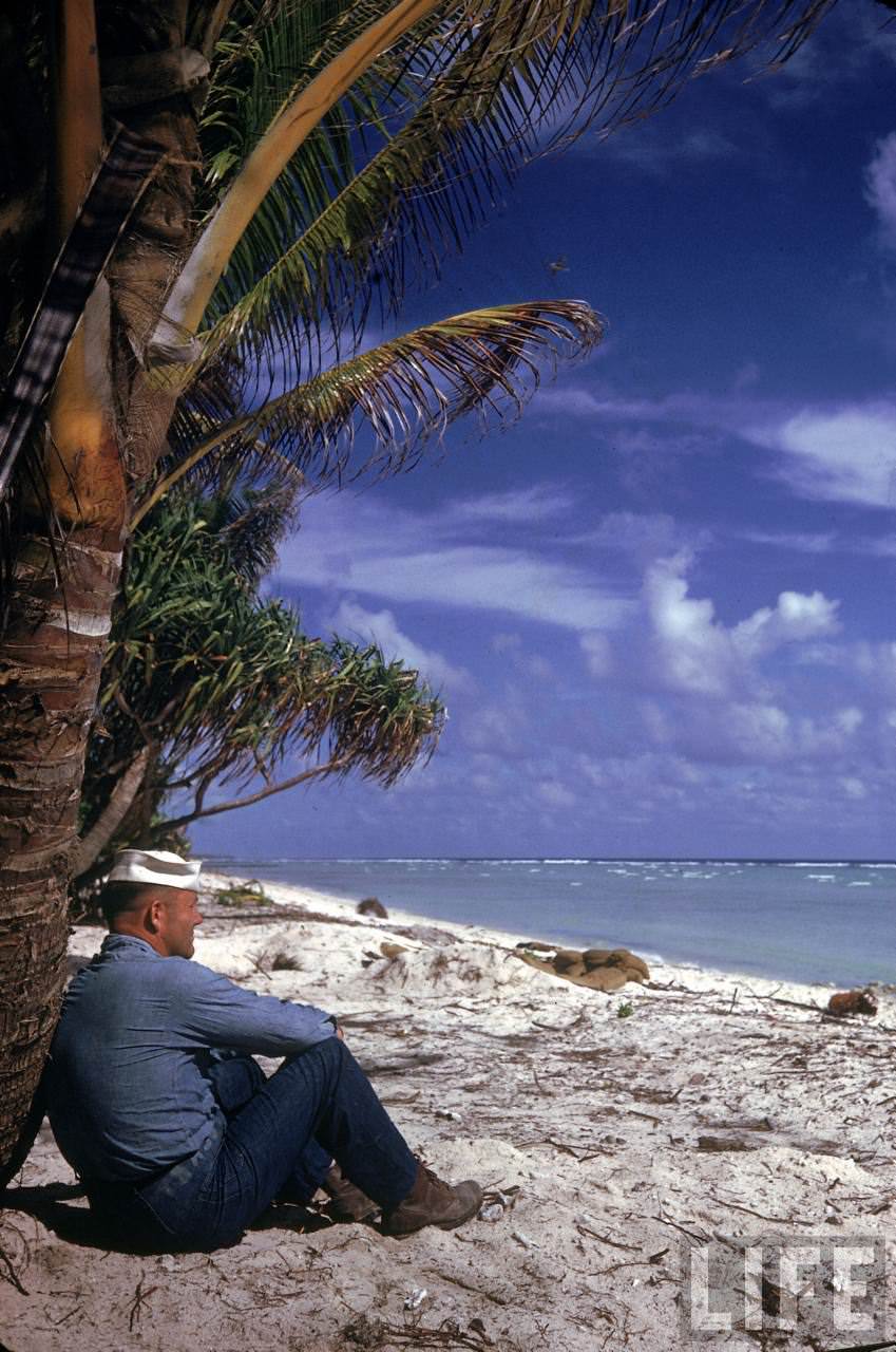 #21 US sailor gazing at the sea from the Tarawa atoll during WWII.