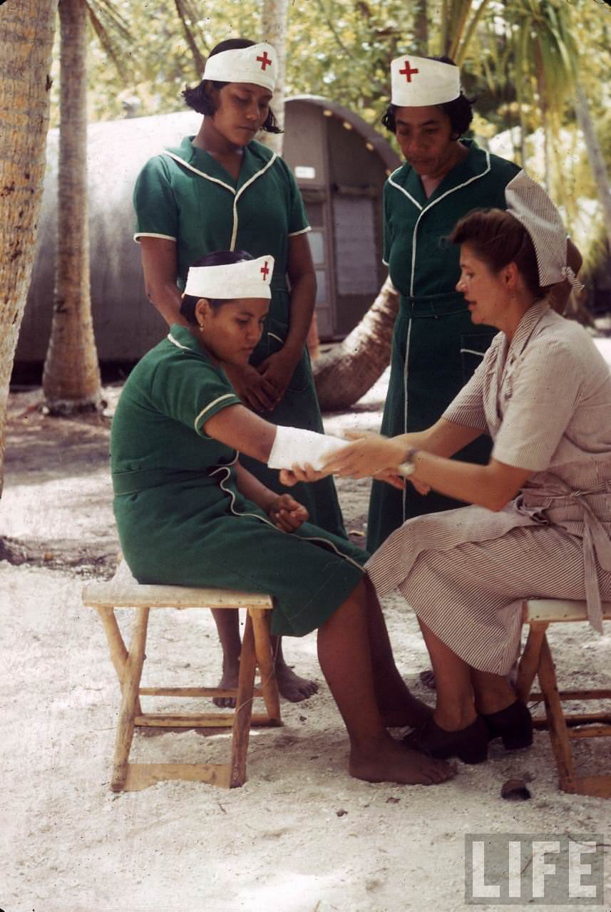 #6 Group of local women being trained as nurses on Tarawa during WWII.