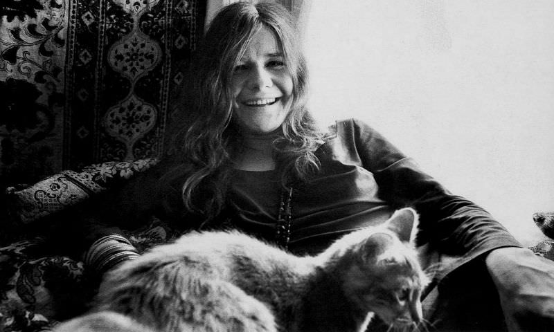 #27 Janis Joplin with her cat at home in Haight-Ashbury, San Francisco, 1967