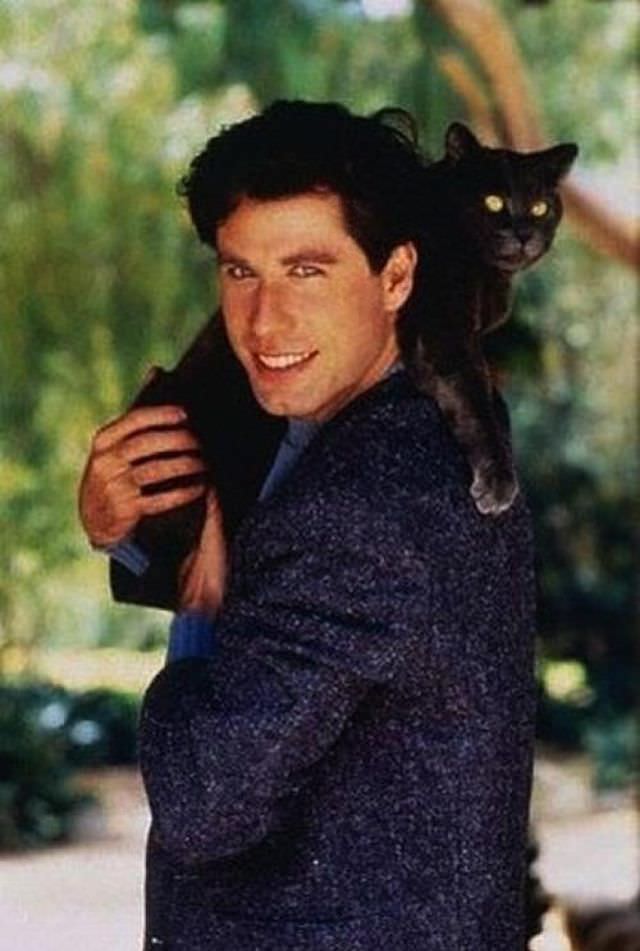 #42 John Travolta with his cat