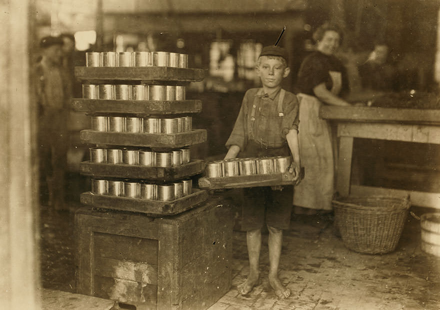 #16 One of the small boys in j. S. Ferrand p[ac]king co. And a heavy load. J. W. Magruder, witness. Location: Baltimore, Maryland