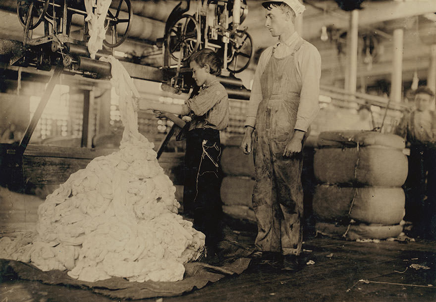 #73 Young boy on warping machine elk cotton mills. Location: Fayetteville, Tennessee