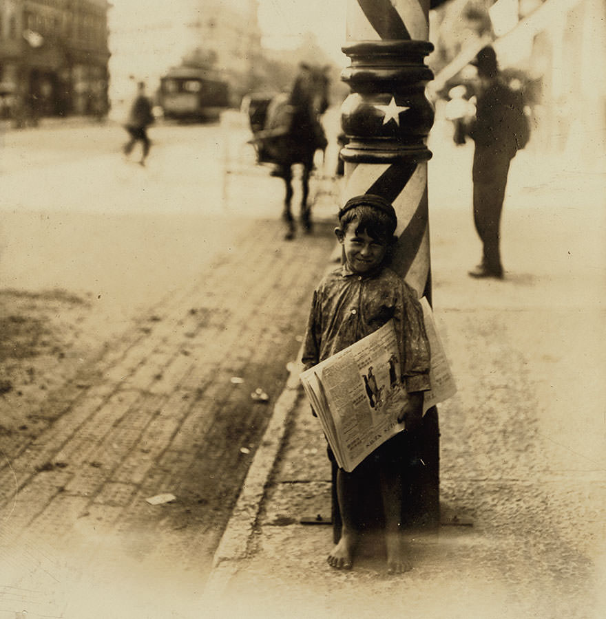 #80 A little “shaver,” Indianapolis newsboy, 41 inches high. Said he was 6 years old. Aug., 1908. Location: Indianapolis, Indiana