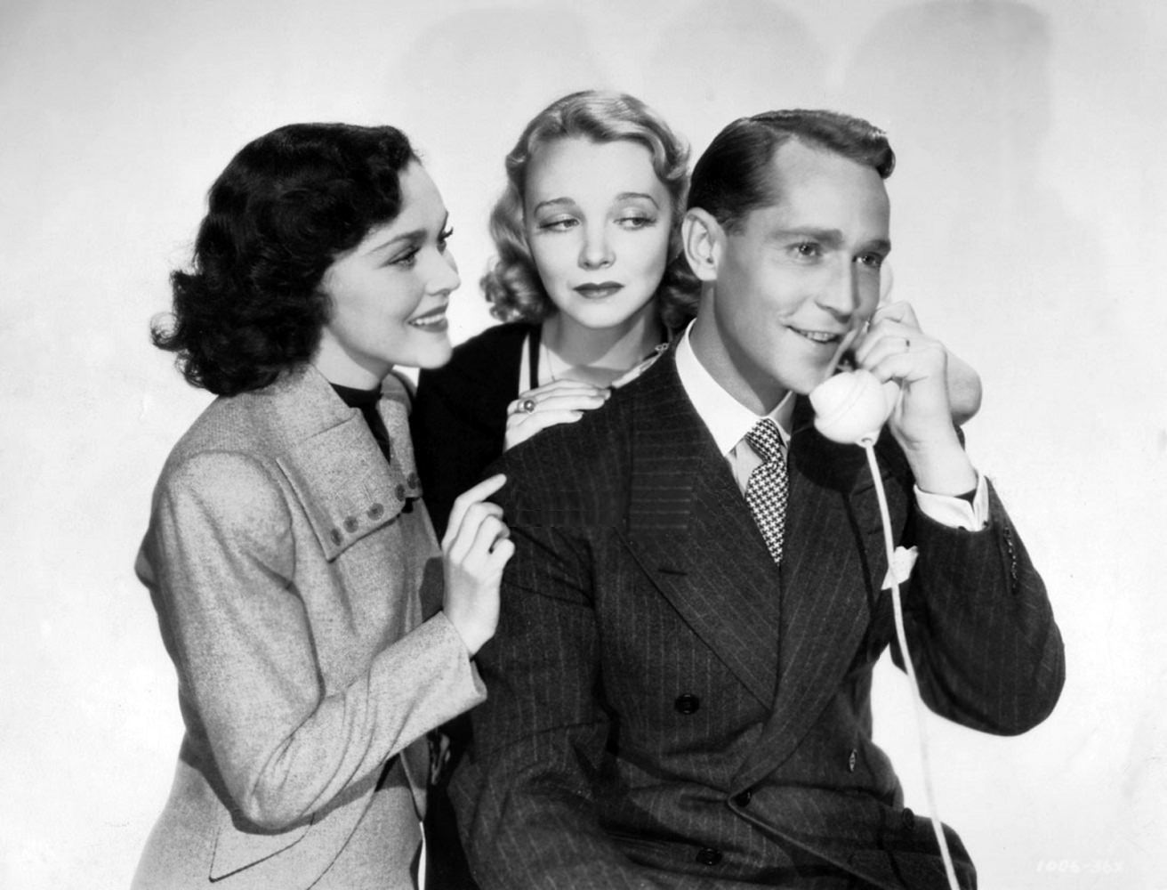 #40 Maureen O’Sullivan, Virginia Bruce and Franchot Tone in Between two women, 1937