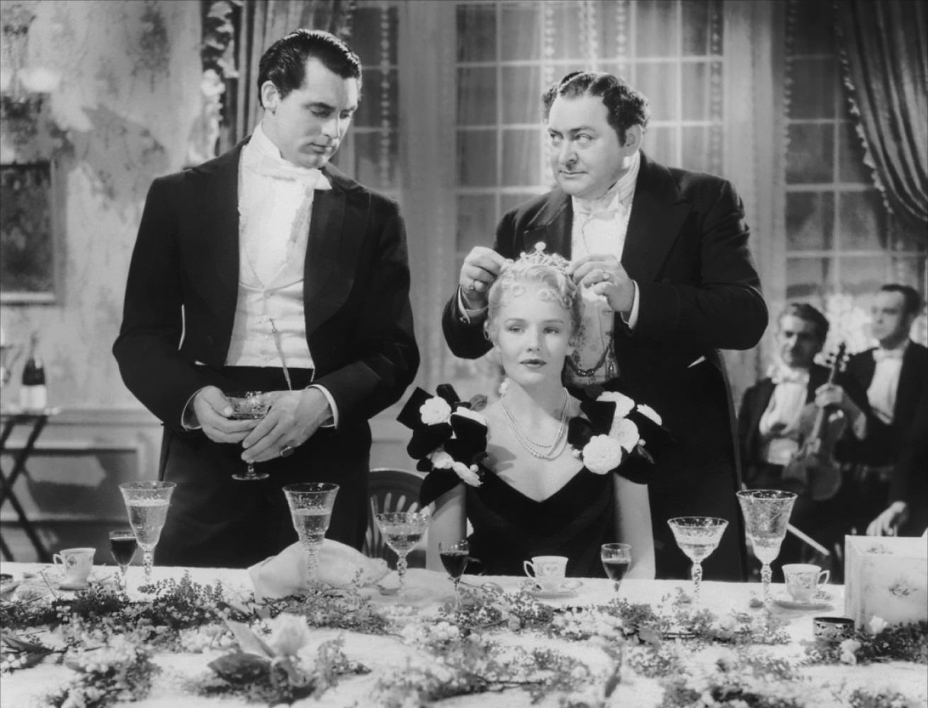 #41 Cary Grant, Frances Farmer and Edward Arnold in The toast of New York , 1937