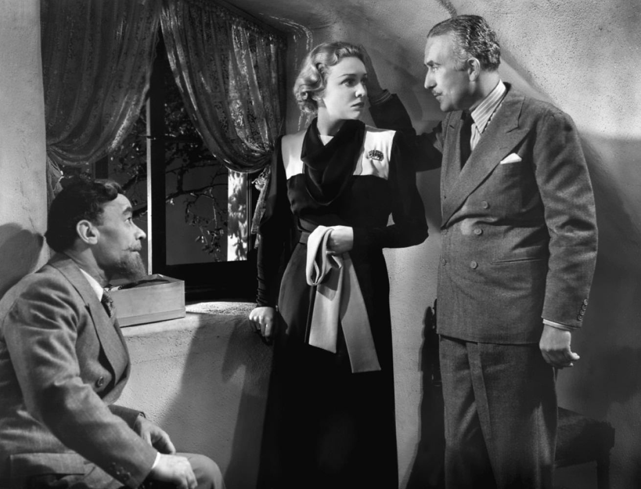#42 Vladimir Sokoloff, Madeleine Carroll and John Holliday in Blockade, 1938