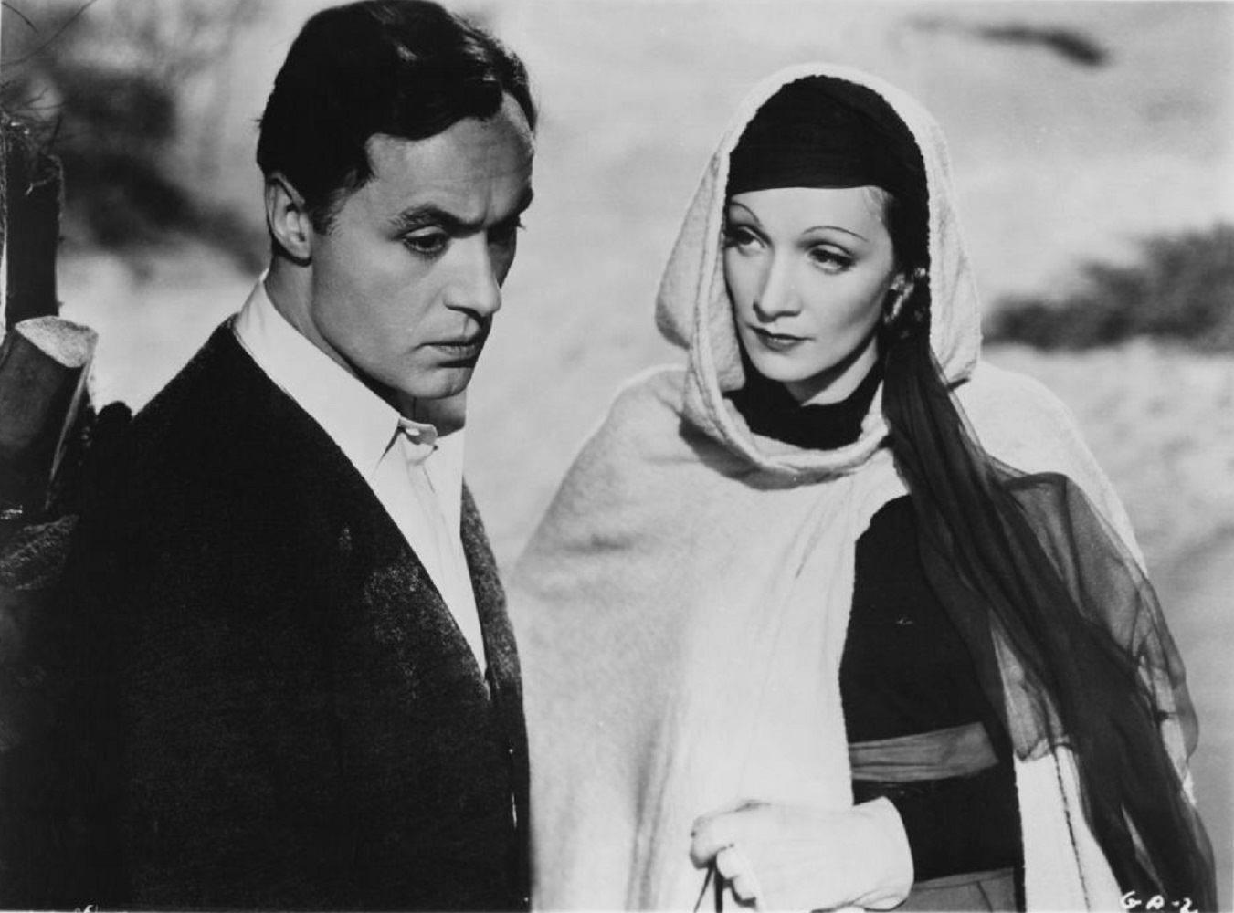#47 Charles Boyer and Marlene Dietrich in The garden of Allah , 1936