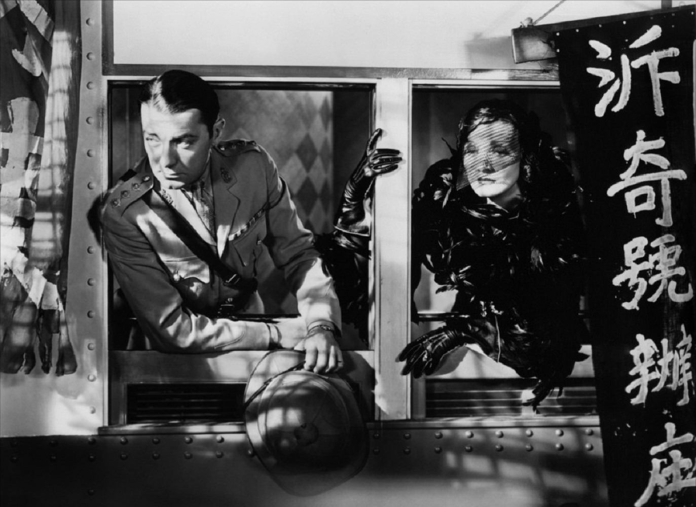 #7 Clive Brook and Marlene Dietrich in Shanghai Express, 1932