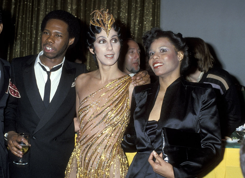 #24 Nile Rodgers, Cher and Alfa Anderson attend the Billboard Magazine’s 1978 Disco Convention Banquet at the New York Hilton Hotel, New York City. Photo by Ron Galella, 1979