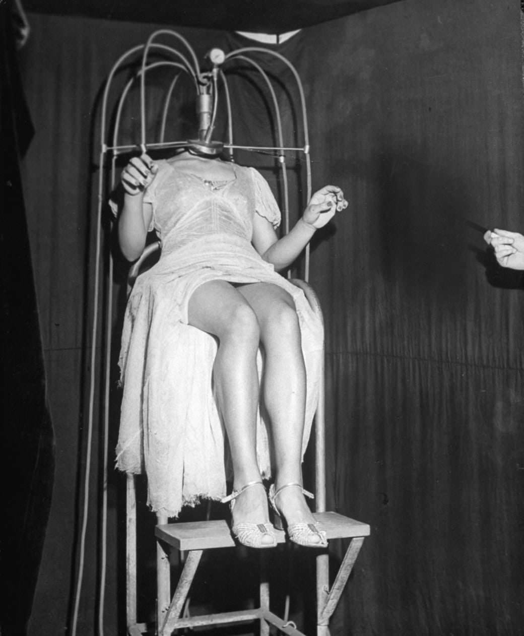 #61 The grotesque sight of a headless woman performing in a Coney Island sideshow in 1945
