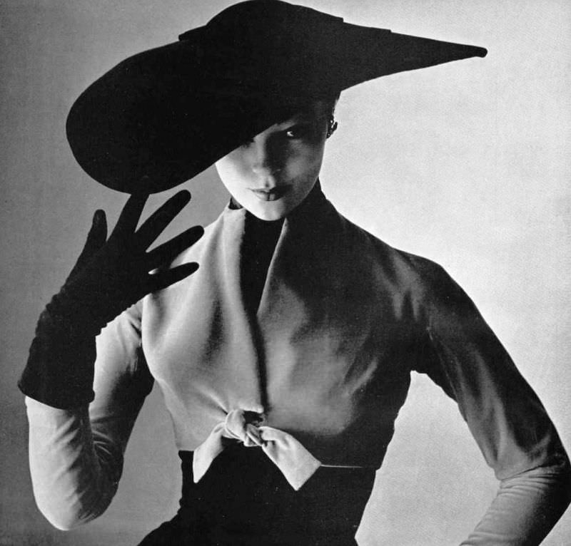 #1 Ivy Nicholson in beige velvet short bolero over wool dress by Christian Dior, 1951