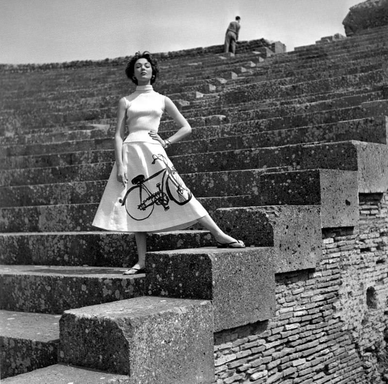 #18 Ivy Nicholson is wearing tricot top with skirt painted by Scarpitta Mirycae, Ostia, Italy, ELLE, June 16, 1952