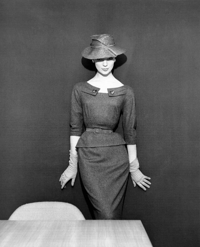 #30 Ivy Nicholson in grey flannel two-piece dress and straw hat by Pierre Clarence, Nouveau Femina, March 1954
