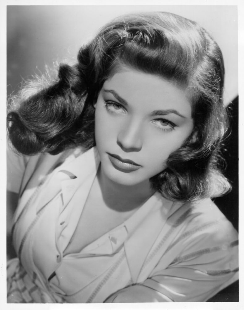 #13 Posing for a portrait, 1943.