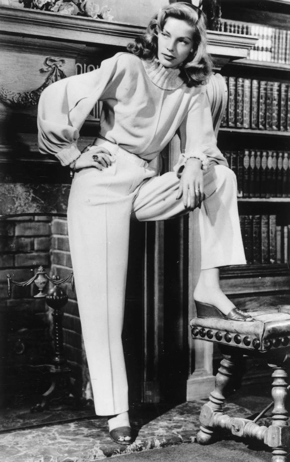 #23 In 1946, the actress got bookish in a wool suit, the work of designer Leah Rhodes.