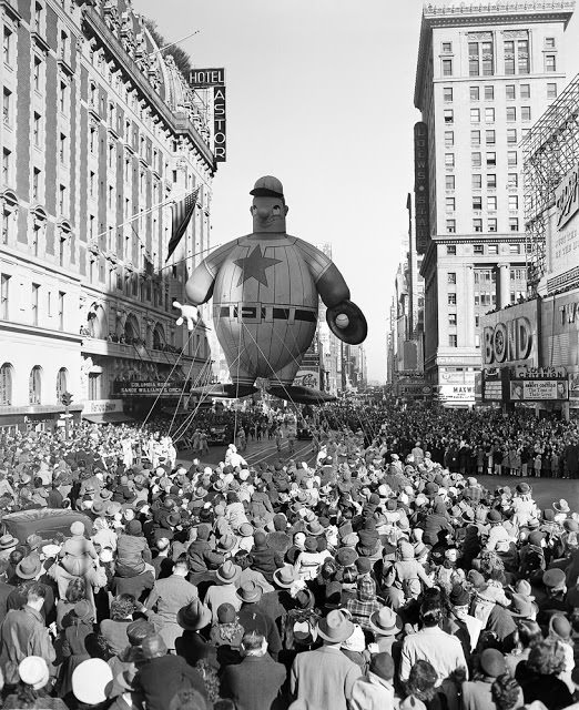 A giant baseball player float moves down 7th Avenue during the Macy’ Thanksgiving Day Parade on Nov. 28, 1946.