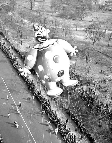 A huge balloon in the form of comic fireman floats over Broadway during the annual Macy’s Thanksgiving Day Parade in New York, Nov. 25, 1948.