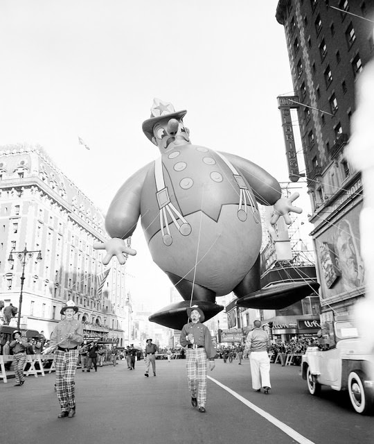 #28 He was 46 feet tall and all gas. Helium, that is. This overwhelming gent floating along Central Park West at 68th St. is shown here in the 1949 parade.