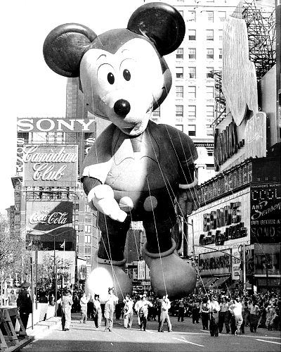 Mickey Mouse calmly surveys the crowd jammed along Central Park West and vice versa, at the 1973 Macy’s Thanksgiving Day parade.