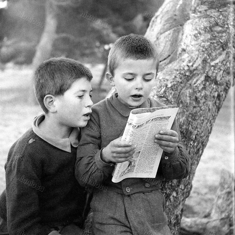 #27 Boys reading a book, 1950