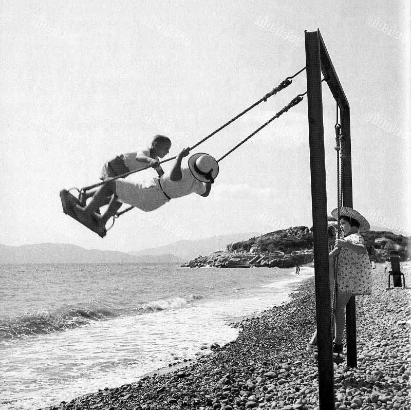 #11 Children swing, circa 1950