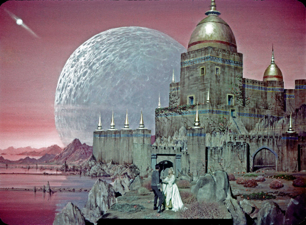 #18 Iconic Star Trek TOS image, an illusion recreating a castle and battle with hostile warriors on Rigel VII, now with Vina to protect, as put in the mind of Christopher Pike by Talosians in the first pilot, The Cage.