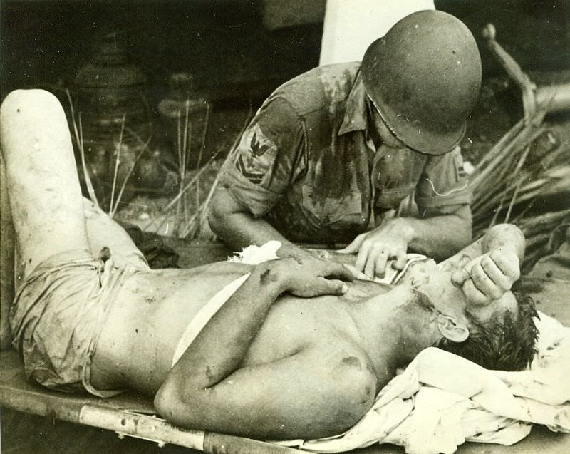 #22 Survivor of U.S.S. Calhoun Gets First Aid