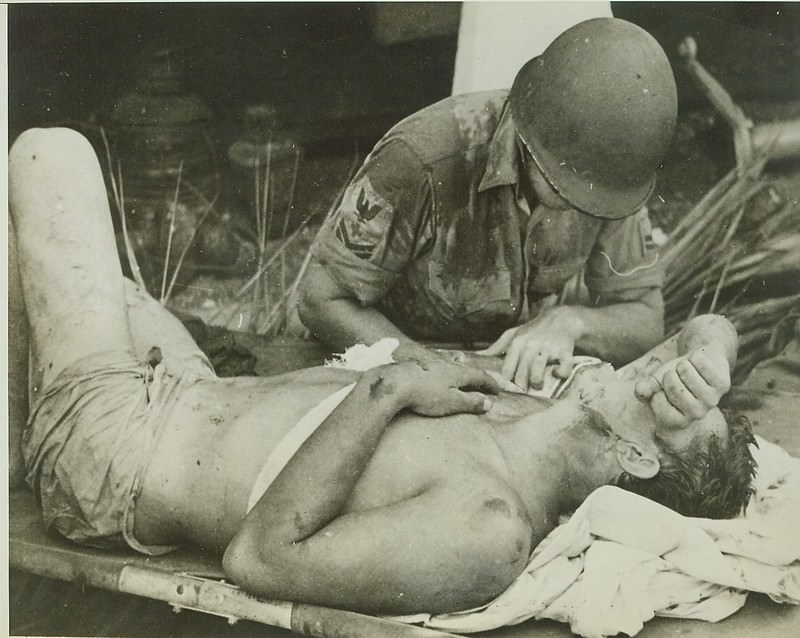 #66 Survivor of U.S.S. Calhoun Gets First Aid, 1942