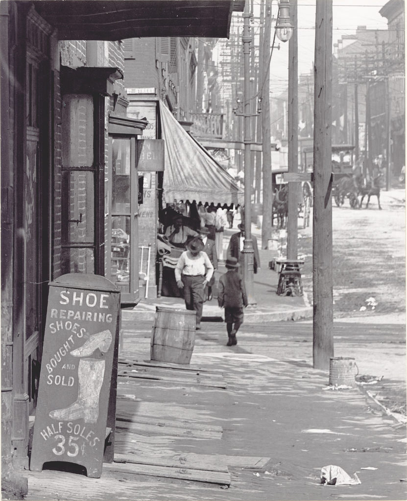 #56 Sidewalk scene on a street in St. Louis, ca. 1900s