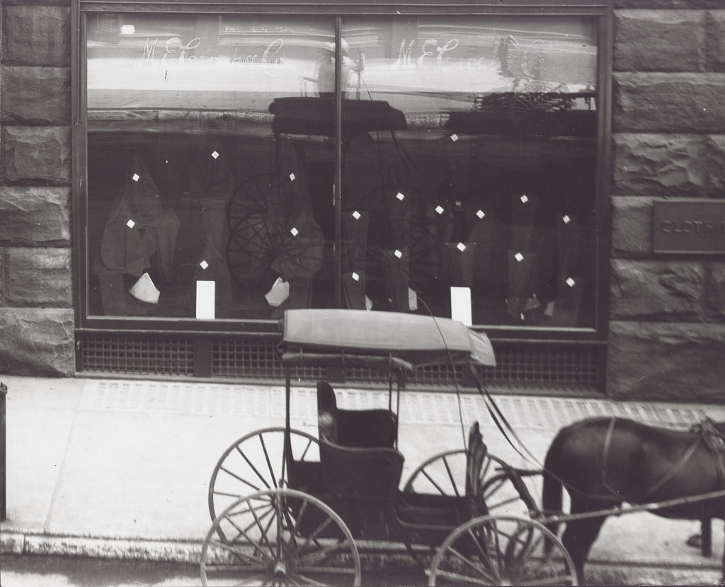 #60 Store front window of M.E. Croak and Company Clothier on the southeast corner of Olive and Tenth Streets, 1904