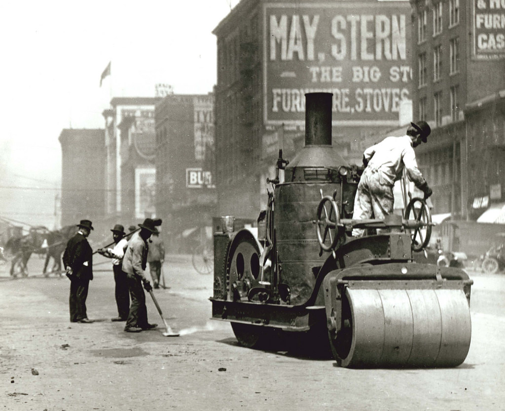 #26 Street workers using a steam roller to repair Twelfth Street between Chestnut and Pine Streets, 1910