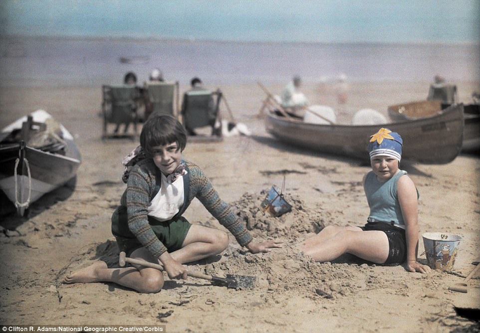 #13 Children play on the sand near Yarmouth, a popular destination for holidaymakers on the Isle of Wight in 1928