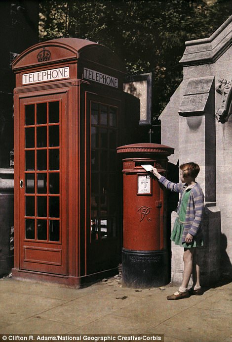 #1 A girl puts an envelope in a postbox in Oxford in 1929