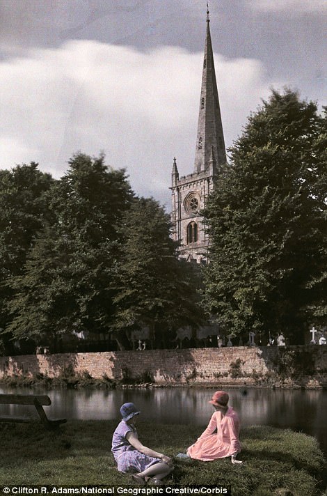 #44 Women sit near the Avon River with Holy Trinity Church behind in Stratford in 1929