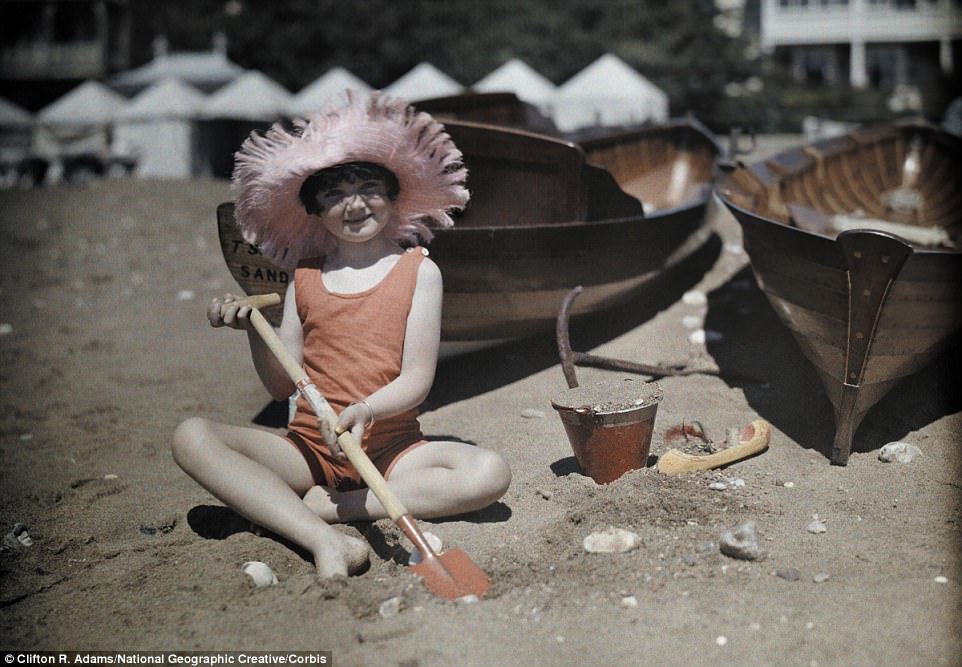 #9 A young girl plays on the beach with bucket and spade in Sandown on the Isle of Wight in 1928