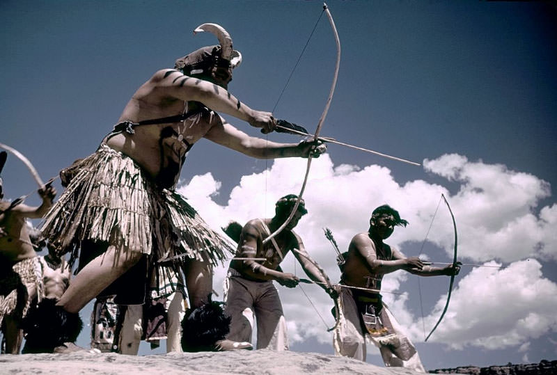 #27 Members of the Shivwitz Paiute tribe show off their prowess with a bow and arrow.