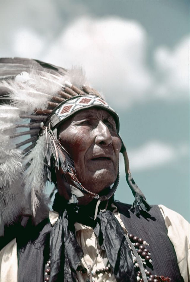 #9 A Native American chief poses for a photo.