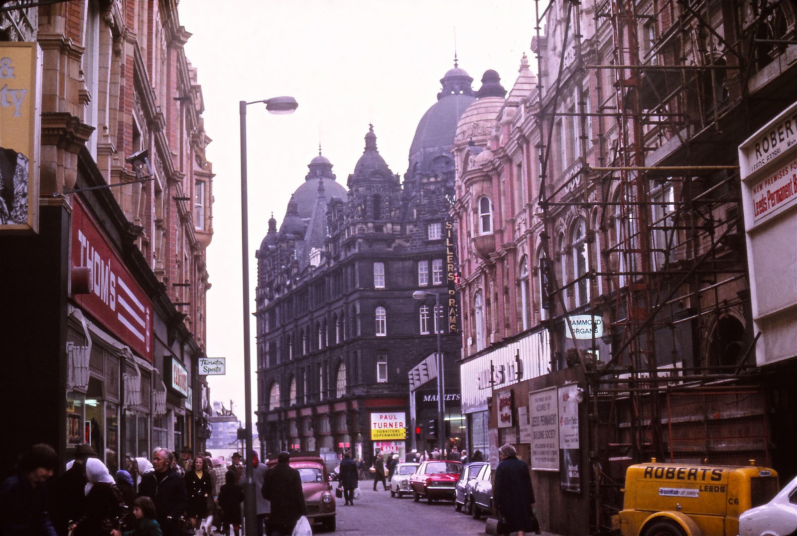 #25 Kirkgate Market still covered in grime. And new premises for the Leeds not-so-Permanent in the long run Building Society. High & Mighty on the extreme left and Thom’s.