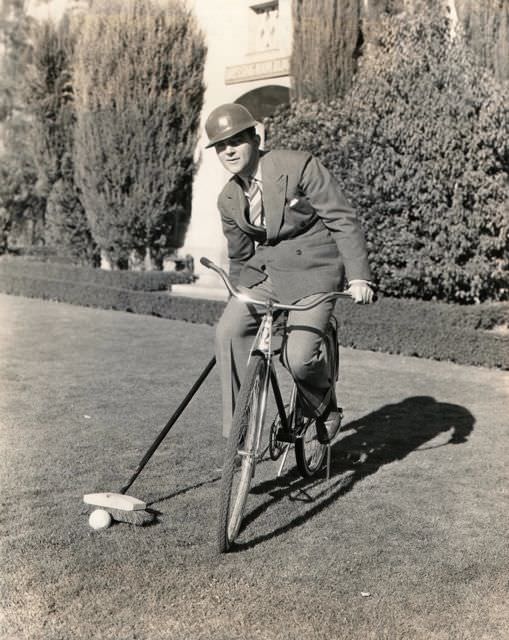 #19 William Gargan riding a bike — and playing polo with a broom, 1942