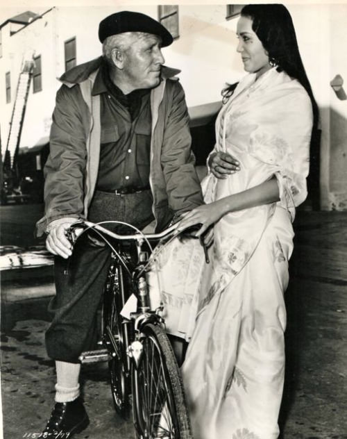 #43 Spencer Tracy riding a bike