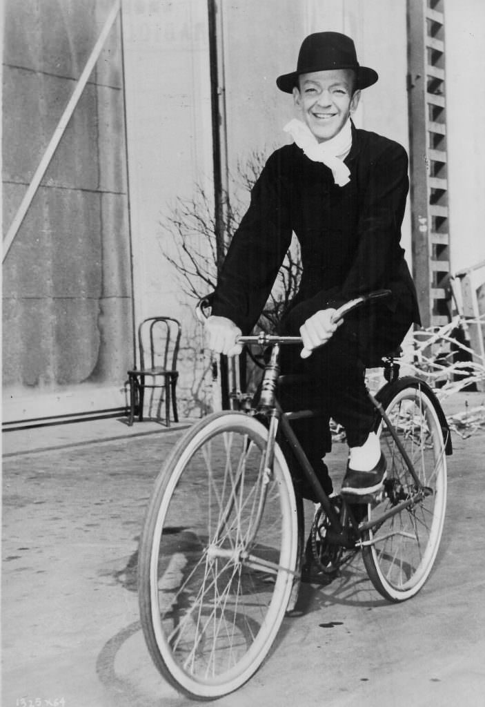 #3 Fred Astaire riding a bike.