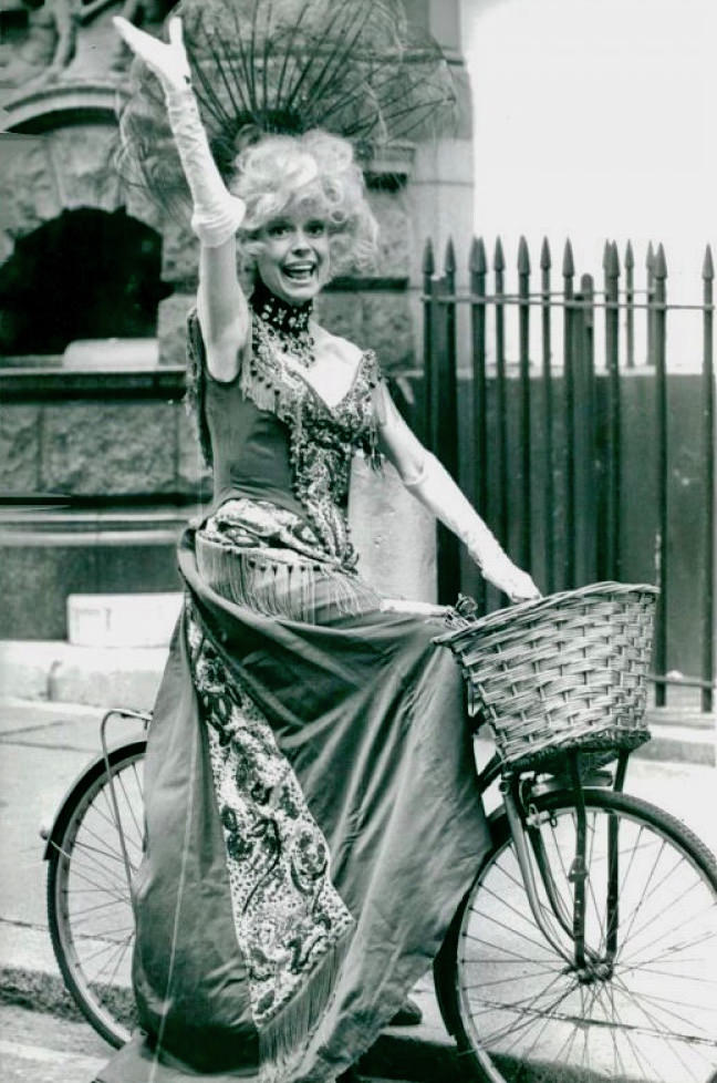#17 Carol Channing riding a bike