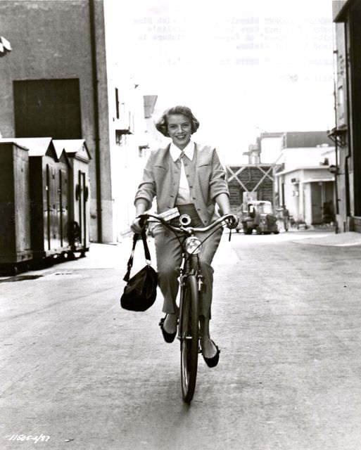 #31 Rosemary Clooney riding a bike