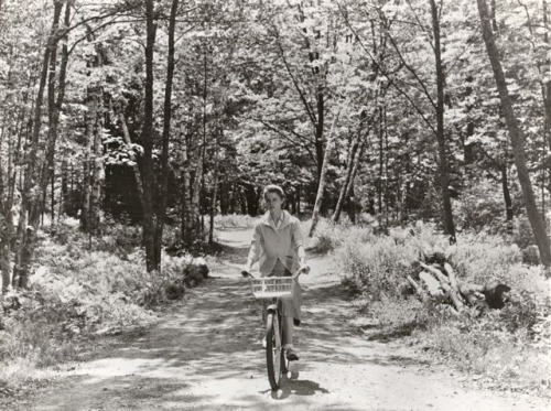#41 Diane Varsi riding a bike