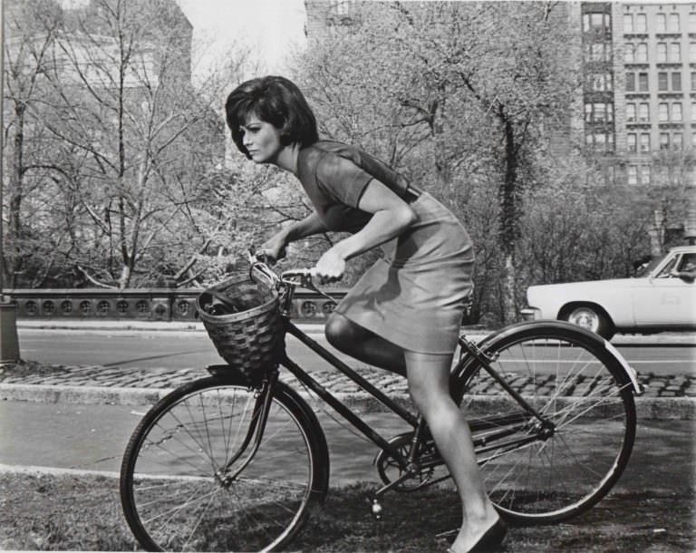 #9 Claudia Cardinale riding a bike in Central Park.